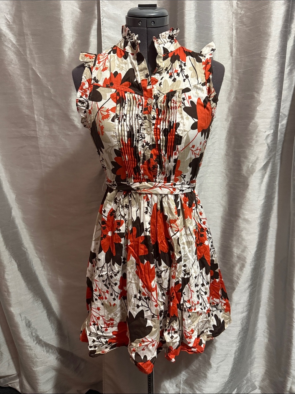 Sleeveless Floral Tie-Waist Mini Dress in Ivory with Red & Brown Blooms